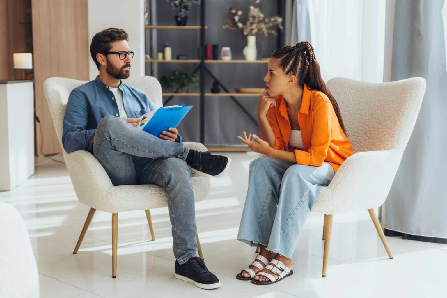 Man speaking with women is massachusetts rehab covered by insurance