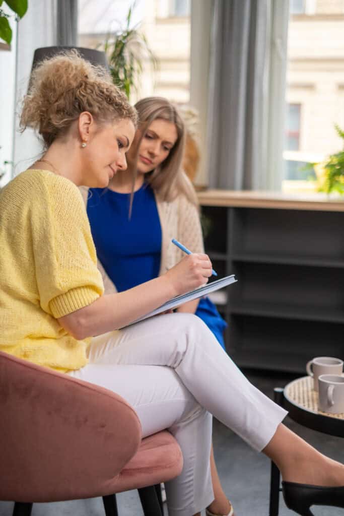 women covering details on Does Insurance Cover Detox in Massachusetts?