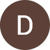 Circle with white letter 'D' on a brown background.